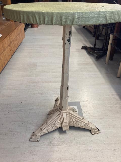 Round table with cast iron stand