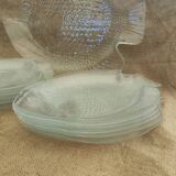 12 plates and a serving dish