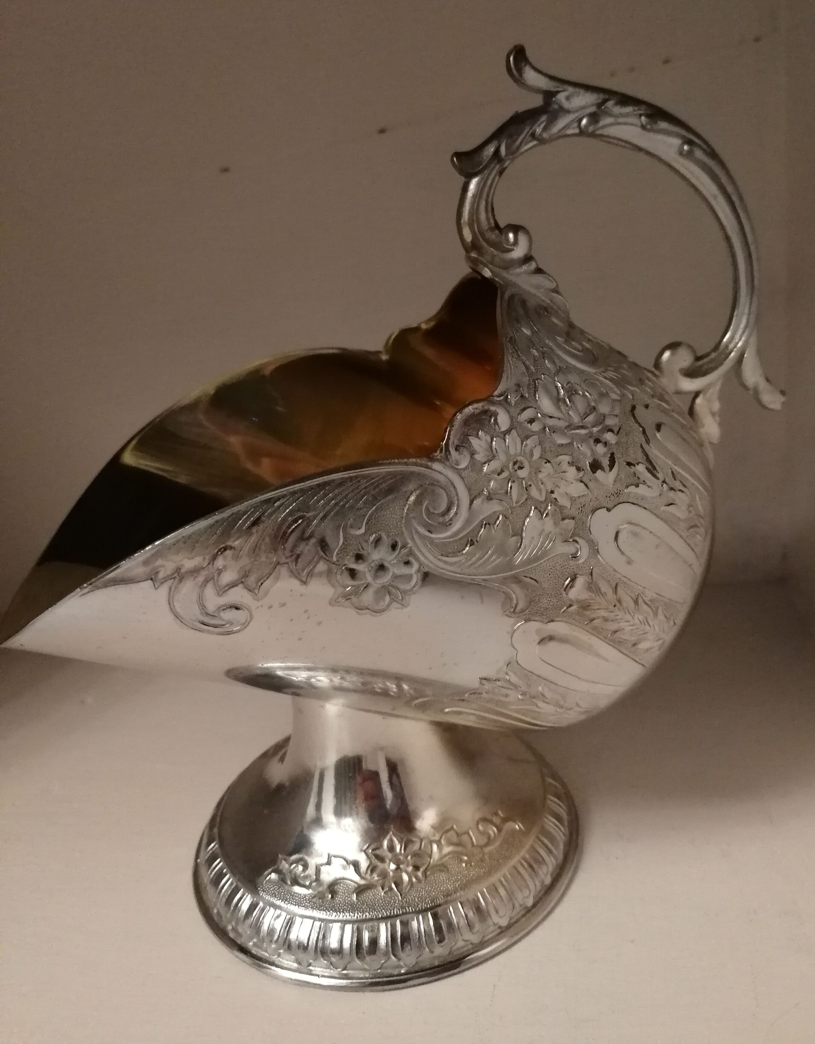 Sugar and sugar shovel in golden silver metal