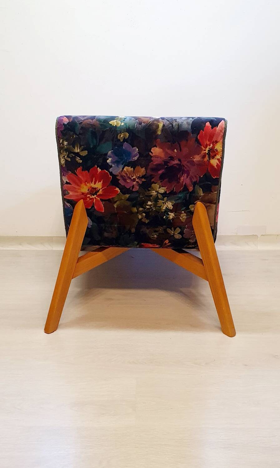 Restored armchair in varnished wood and fabric