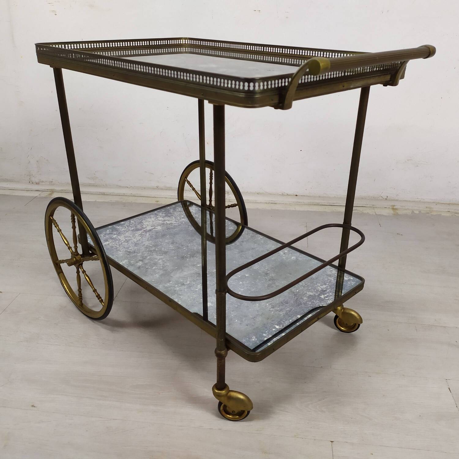 Brass and glass rolling trolley