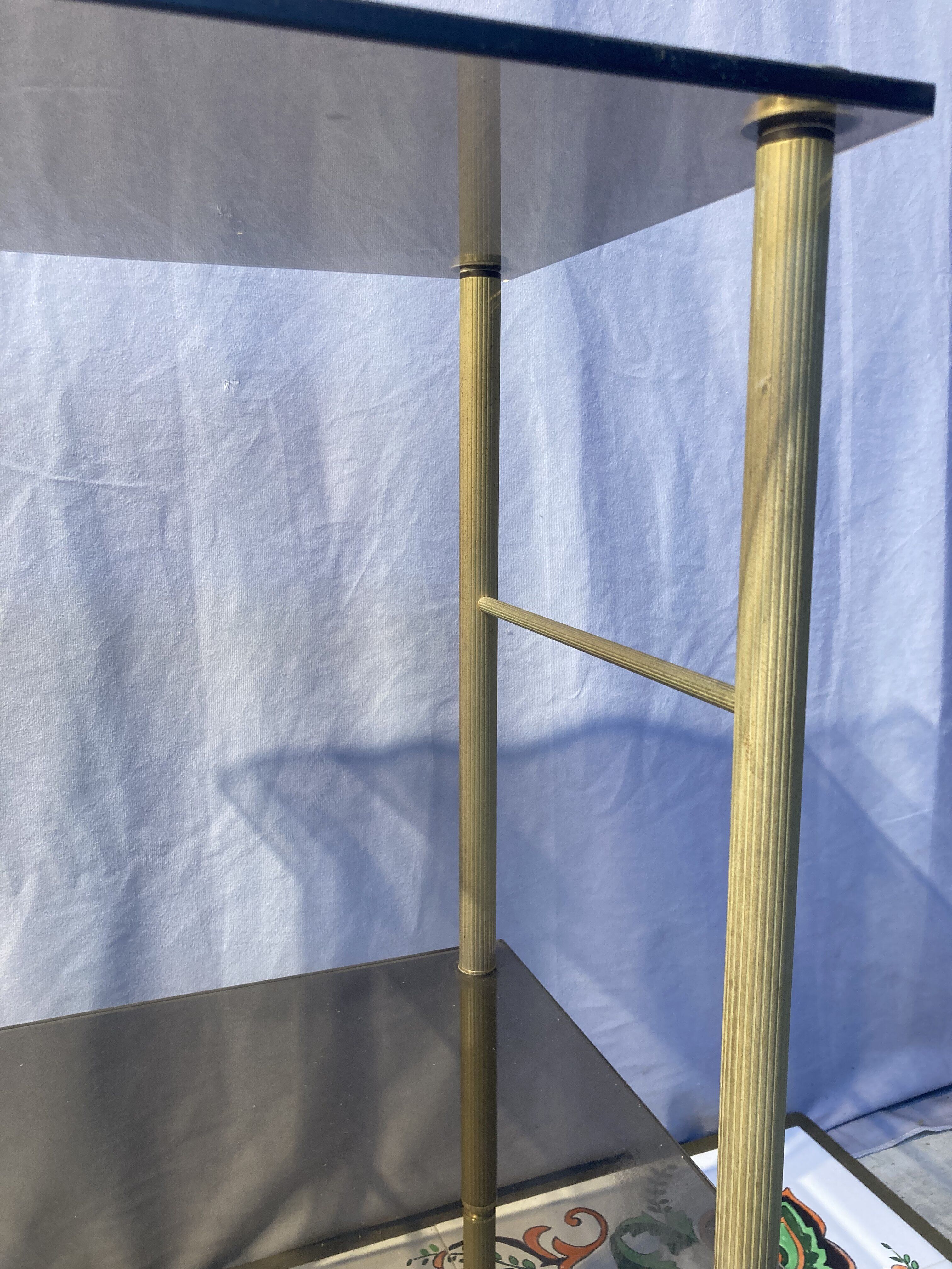 Brass side table and smoked tempered glass