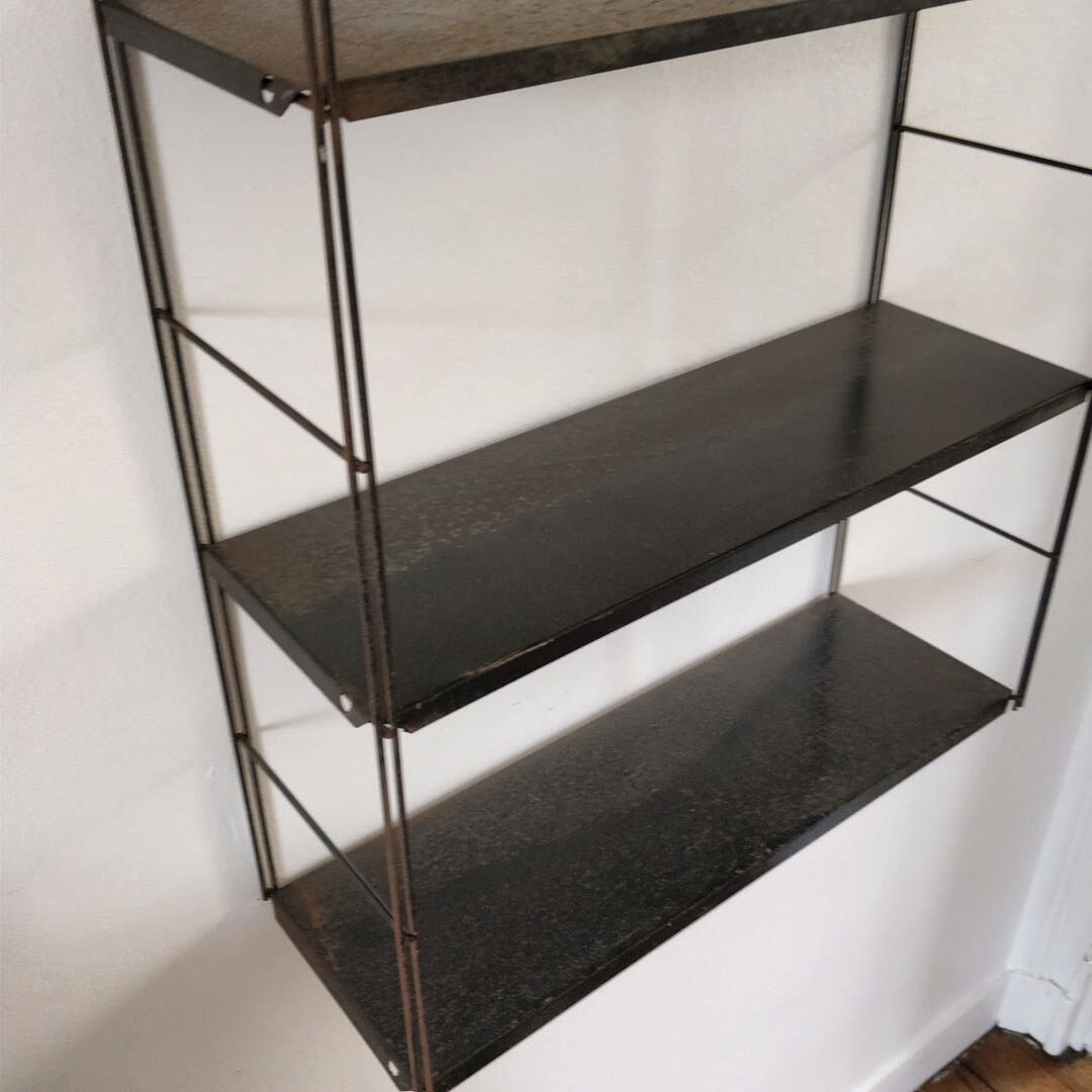 Patinated metal wall shelf