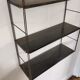 Patinated metal wall shelf