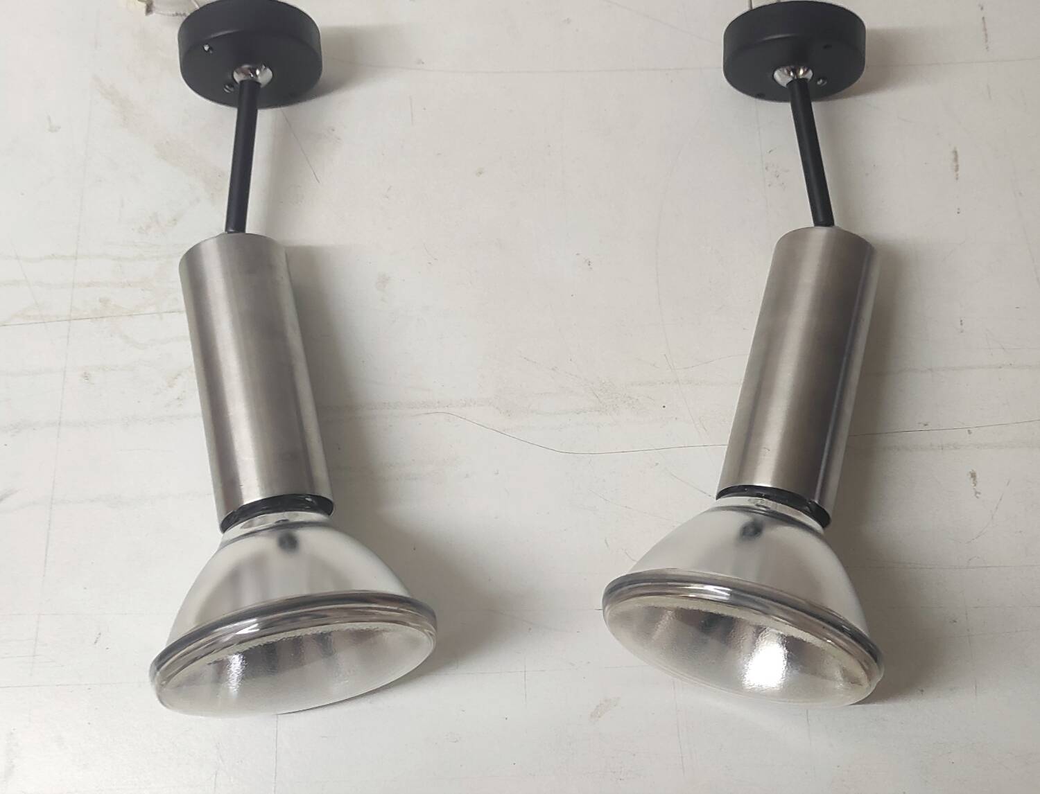 Wall lights - duo of articulated spots in chrome and black metal - 1970s