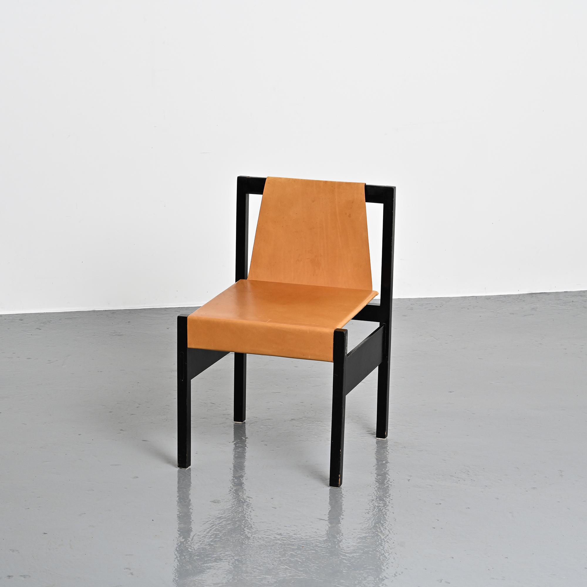 Set of black lacquered wooden chairs with leather, Swiss architect's work, 1980s.