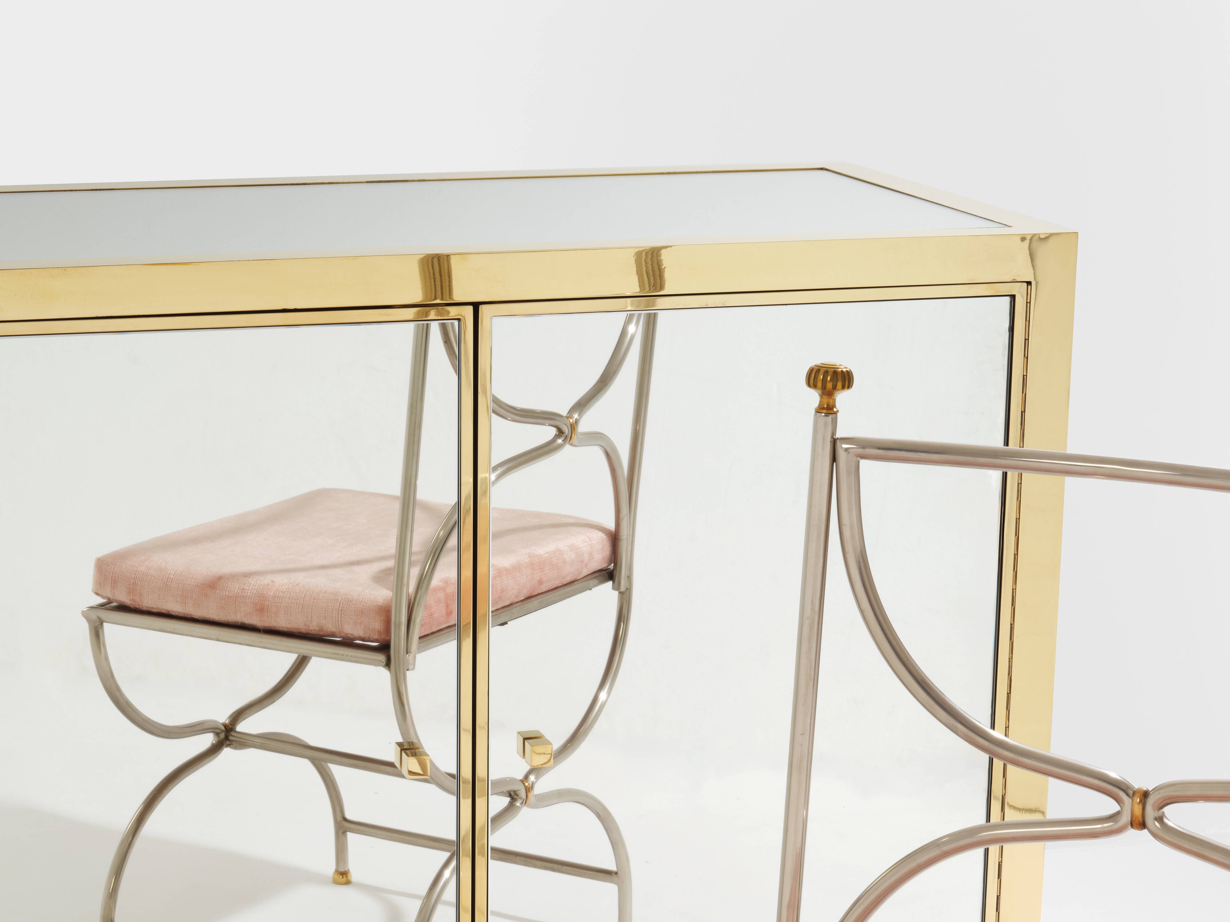 Brass sideboard with mirror and plexiglass legs by Michel Pigneres, 1970