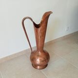Old italian amphora vase in hammered copper