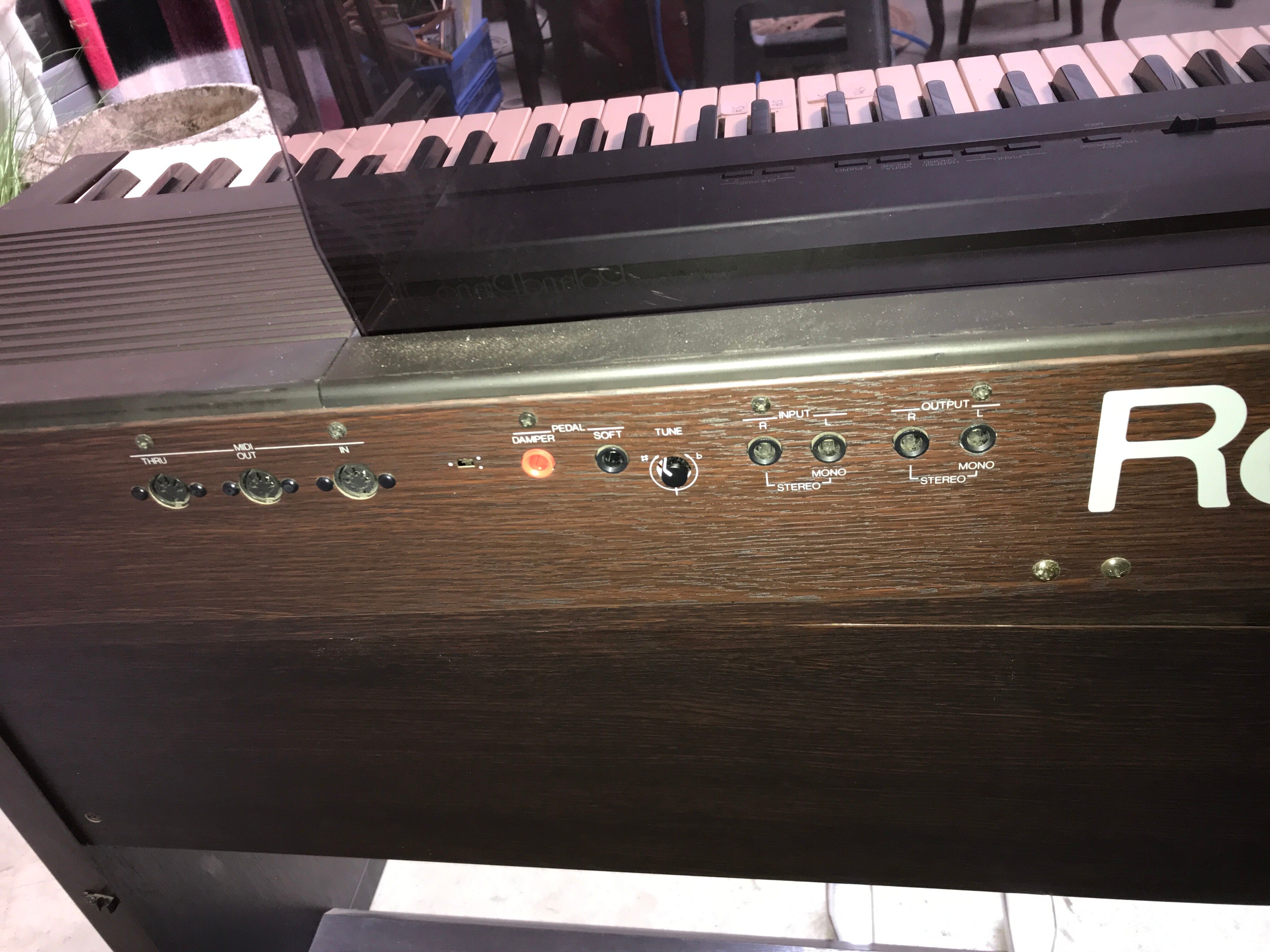 Roland HP 700 keyboard and its stand with pedal