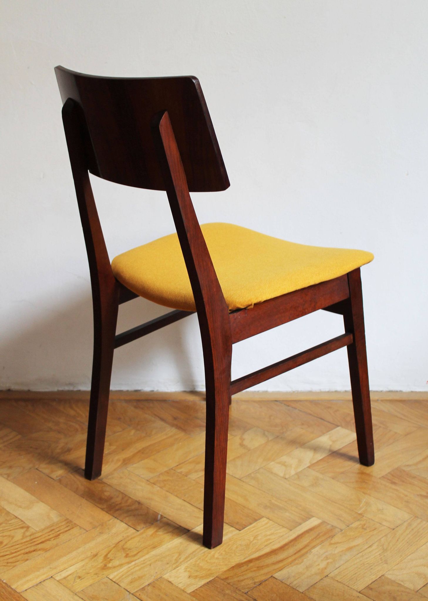 Vintage dining chair from the 1960s, Scandinavian style, wood and fabric.
