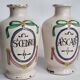 Pair of antique apothecary pots in glazed ceramic, decorated by hand