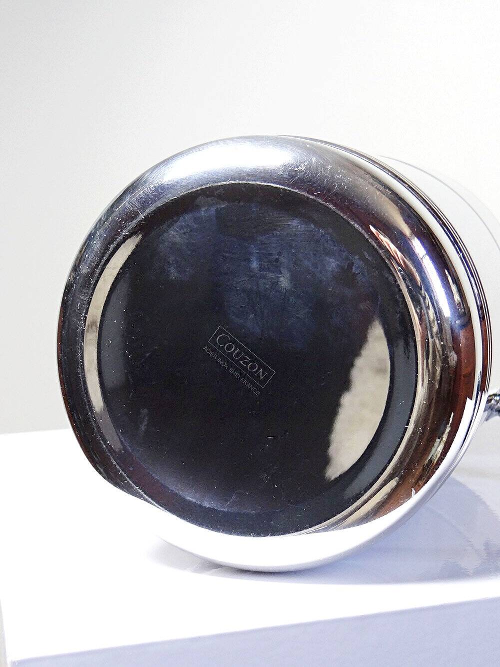 Vintage champagne bucket from the 80s-90s by Orfévrerie Jean Couzon in 18/10 stainless steel.