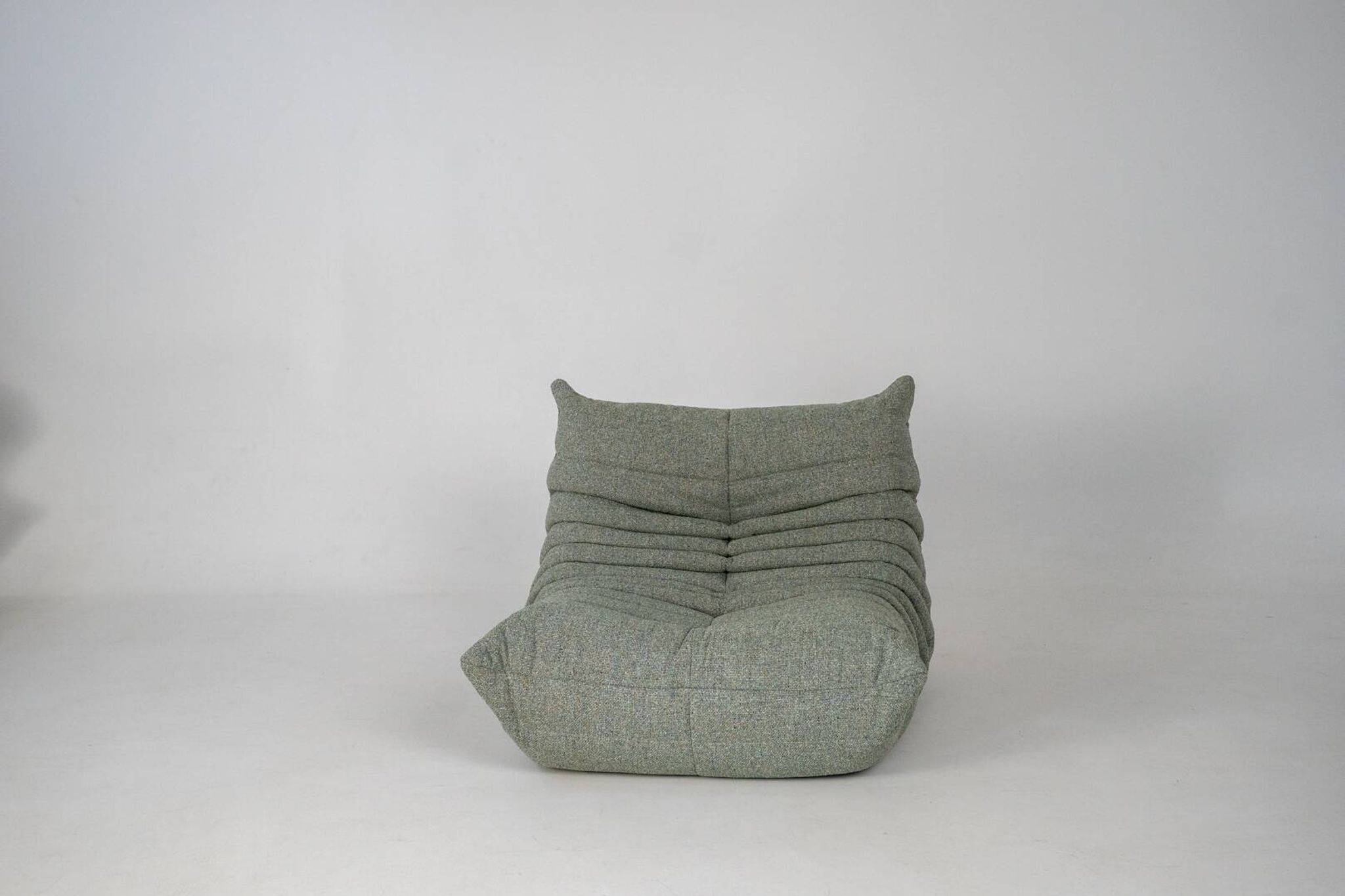 Togo set of armchair and pouf in melange tweed