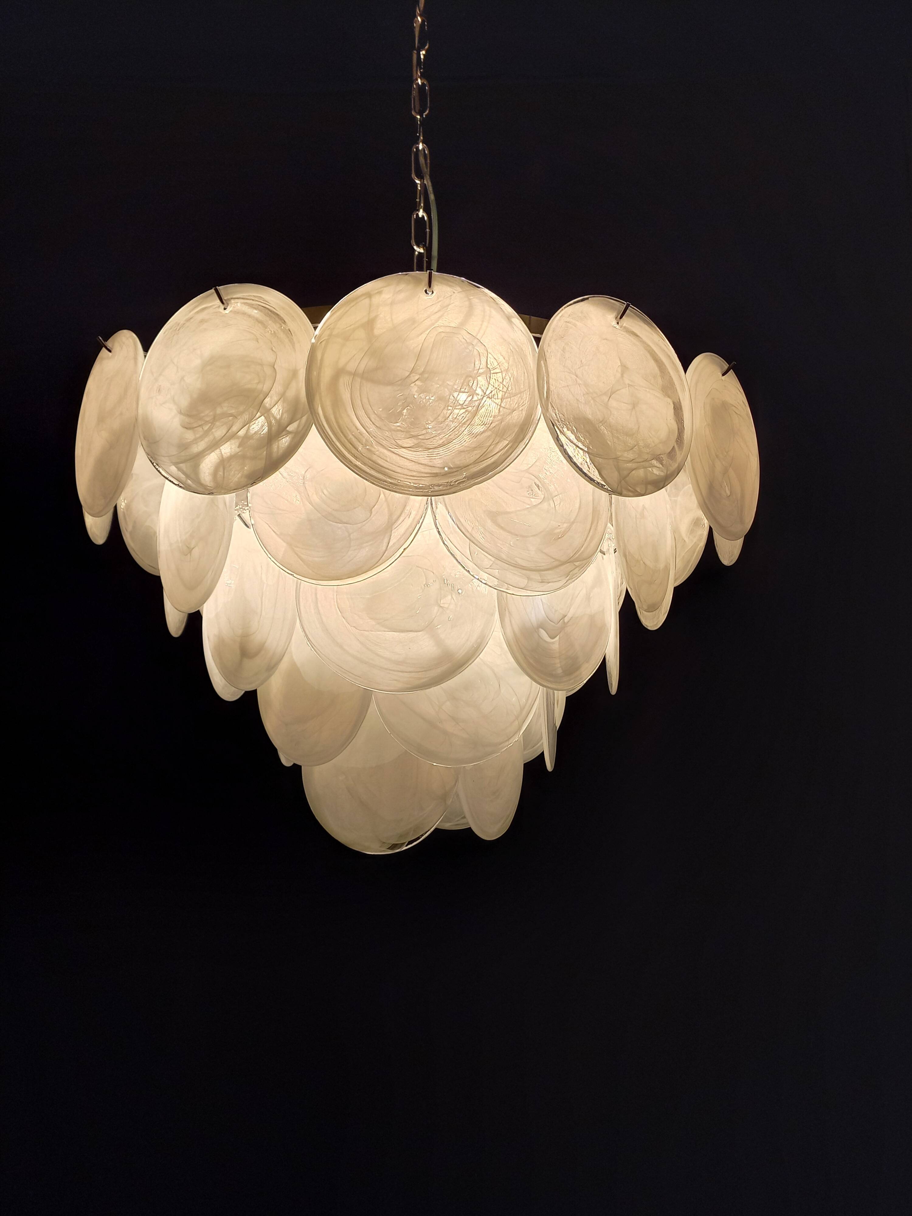 Handcrafted chandelier with Murano glass and handmade alabaster discs.