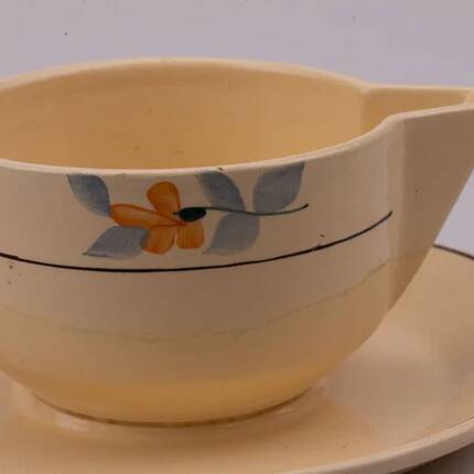 Saucière vintage en céramique Saint-Amand crème et à motifs fleuris
