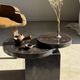 Brown petrified wood coffee table from Indonesia with a double circular top.