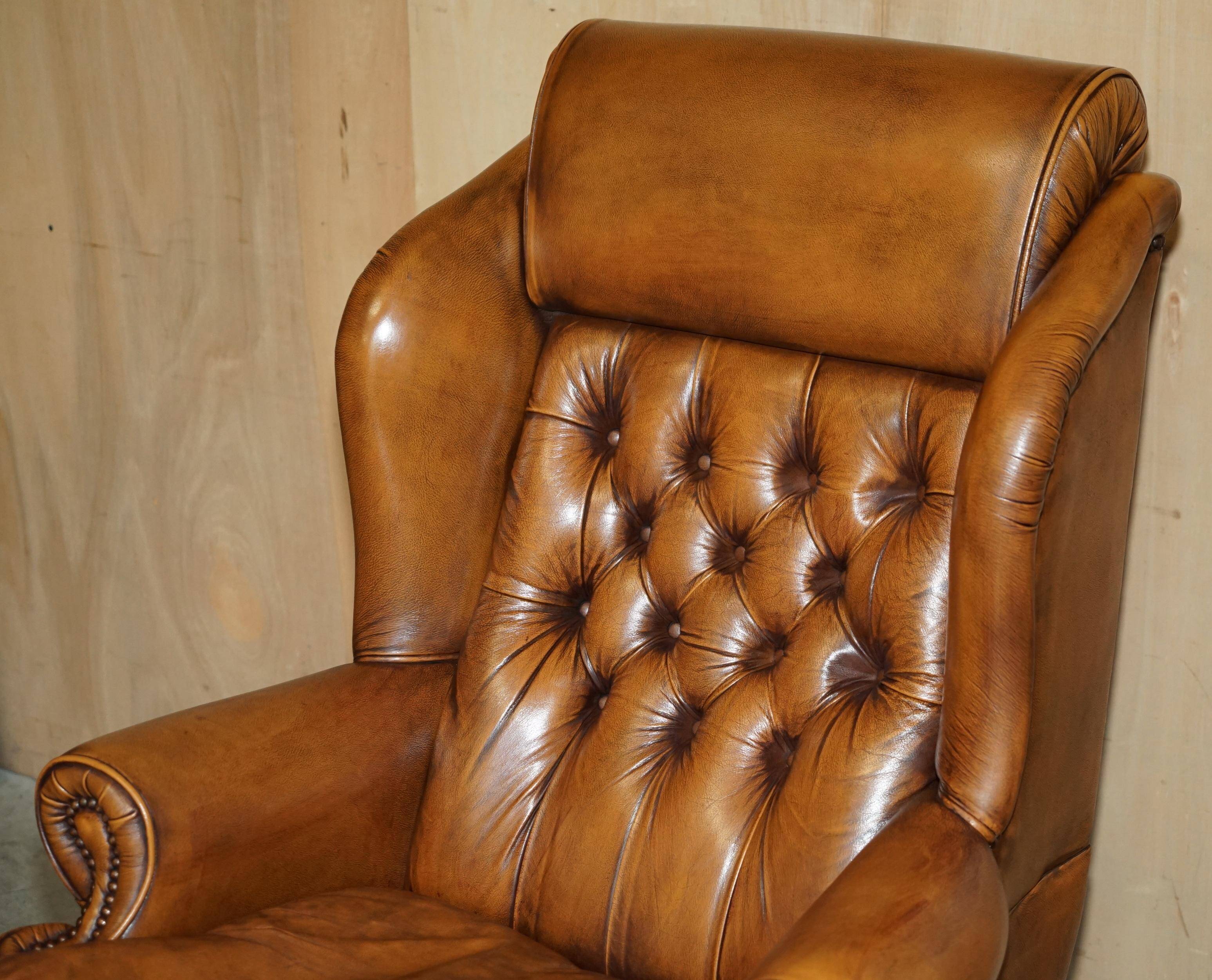 Captain's chair Chesterfield vintage leather with tufted wingback.