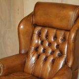 Captain's chair Chesterfield vintage leather with tufted wingback.