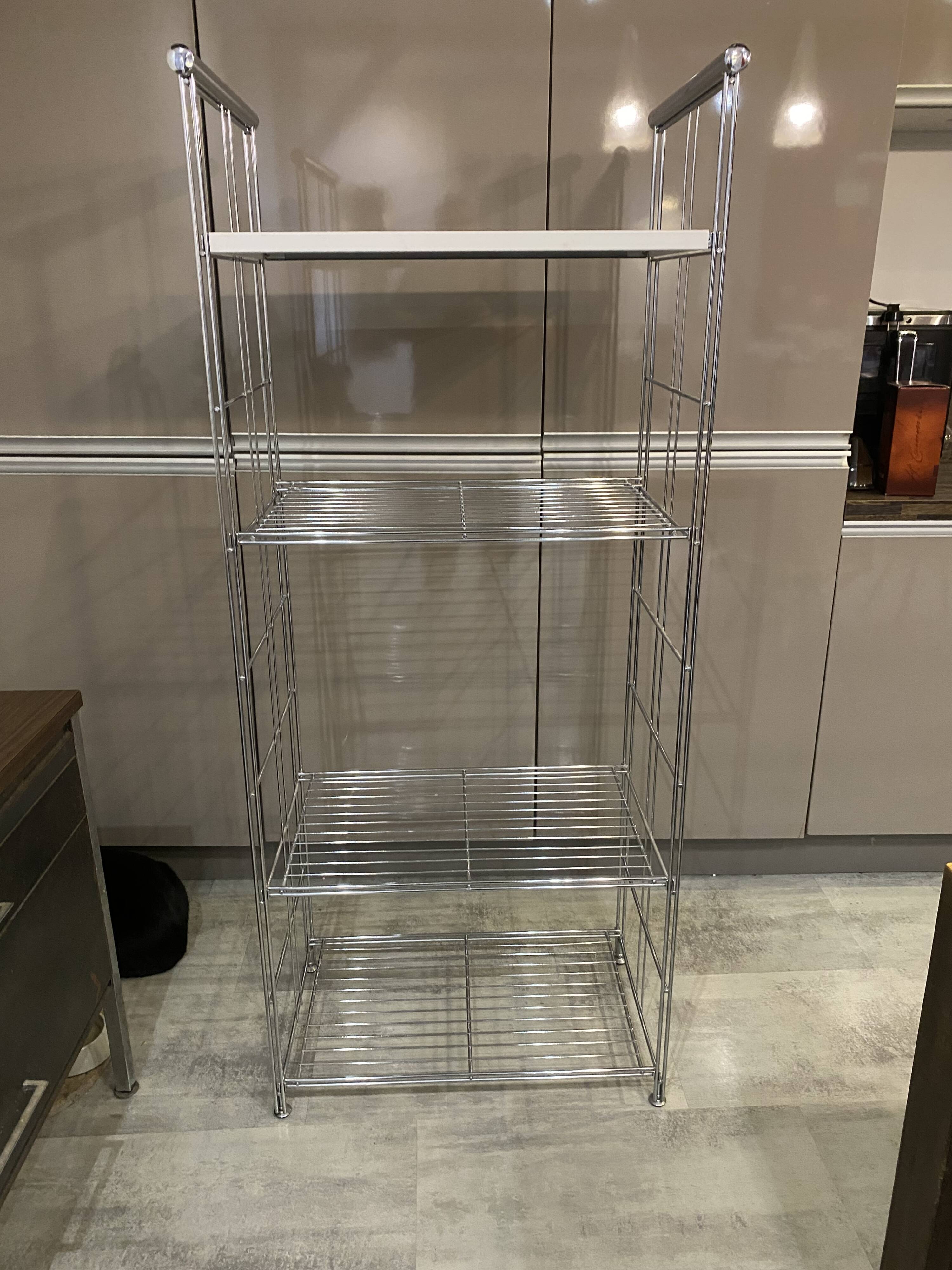 Modular wall bookshelf desk in vintage chrome.