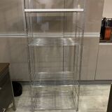 Modular wall bookshelf desk in vintage chrome.