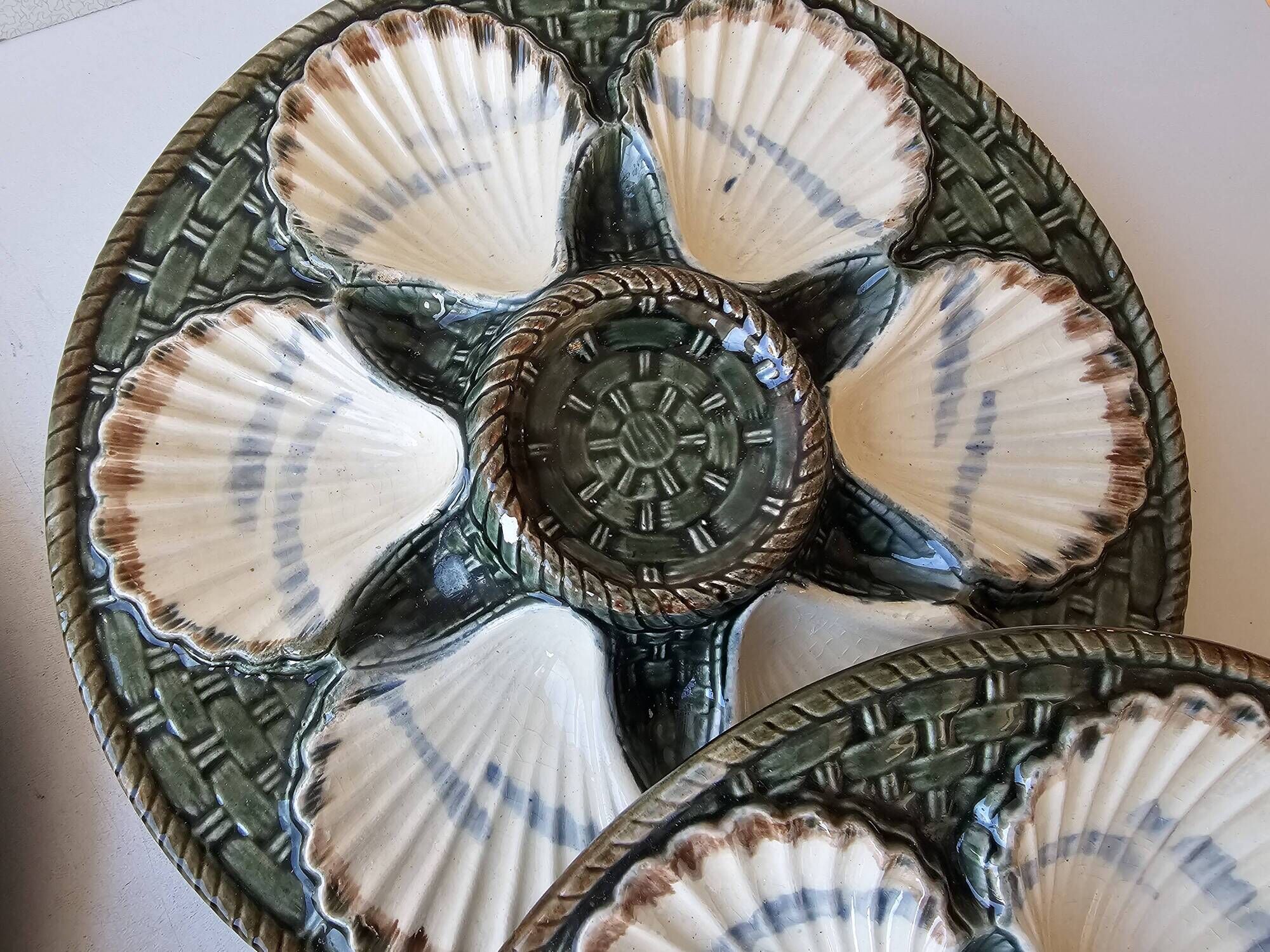 Set of 4 vintage green and white majolica oyster plates.