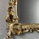 Large gilded wooden mirror in Louis XV style, 19th century.