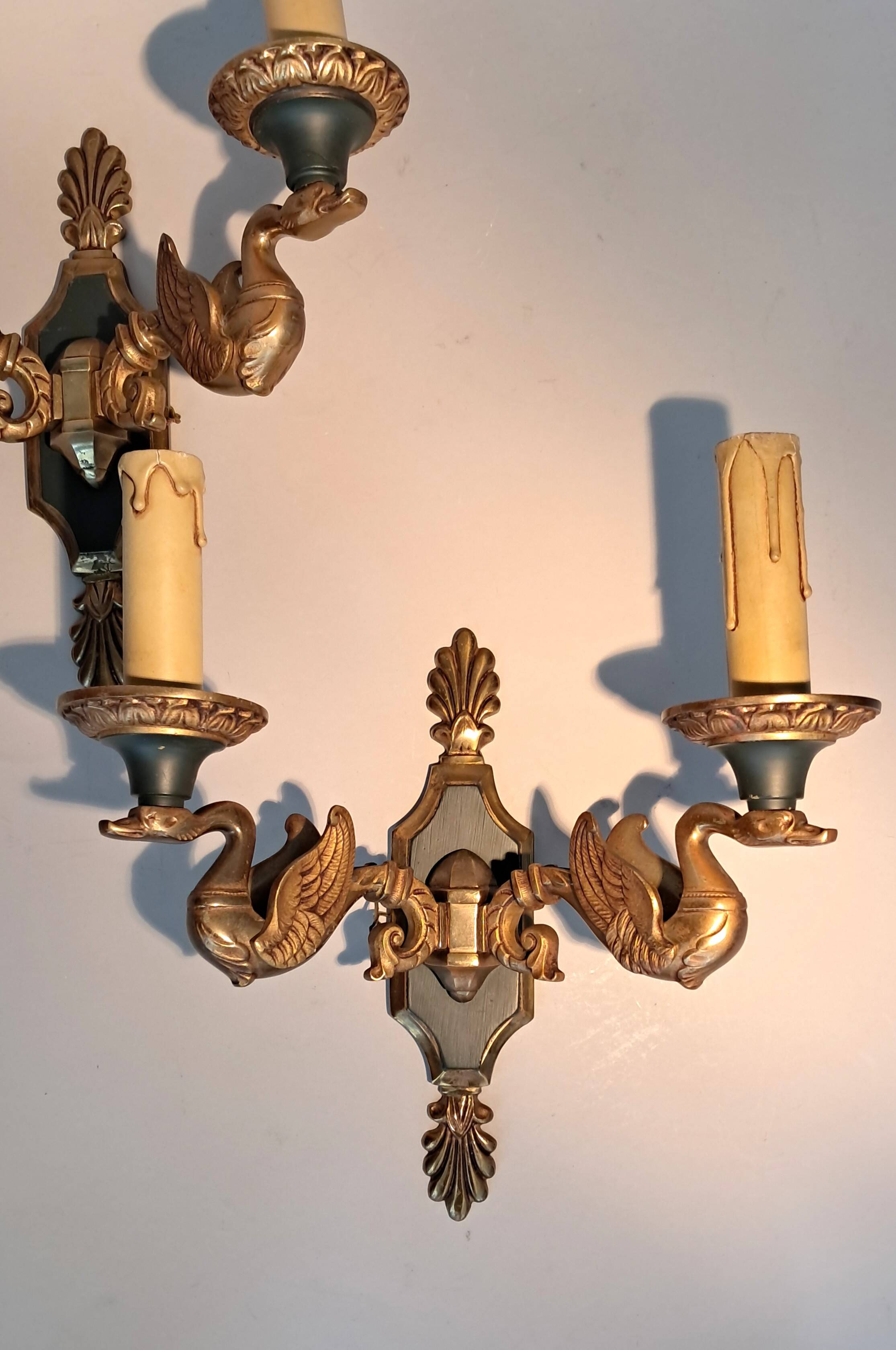 Pair of gilded bronze and green lacquer wall sconces by Maison Lucien Gau, Paris.
