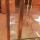 Trolley on wheels in gilded brass and beveled glass