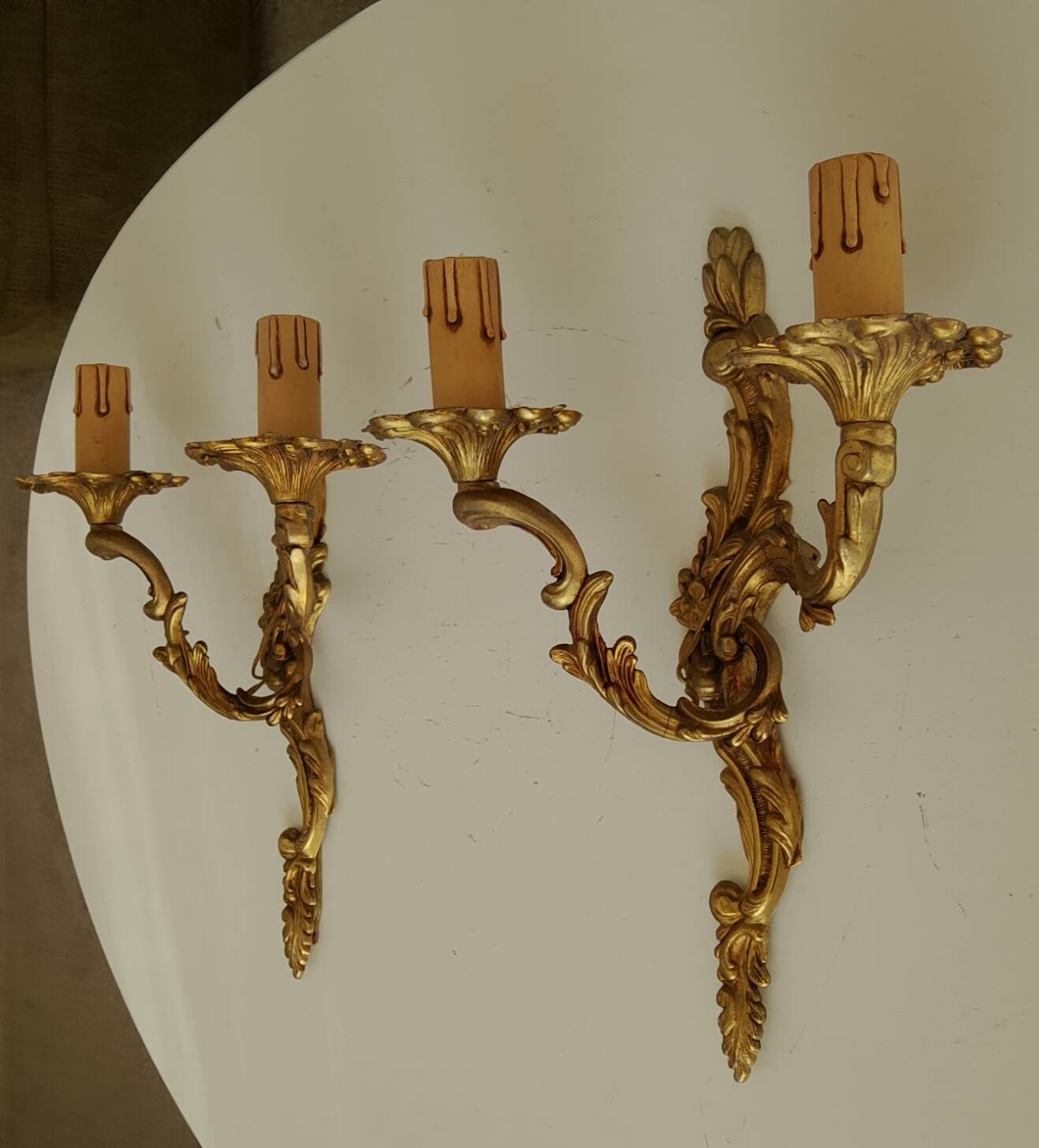 Pair of antique Rococo wall sconces in Louis XV style.