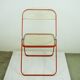Red Plia Lucite folding chair by G. Piretti for Castelli Italy