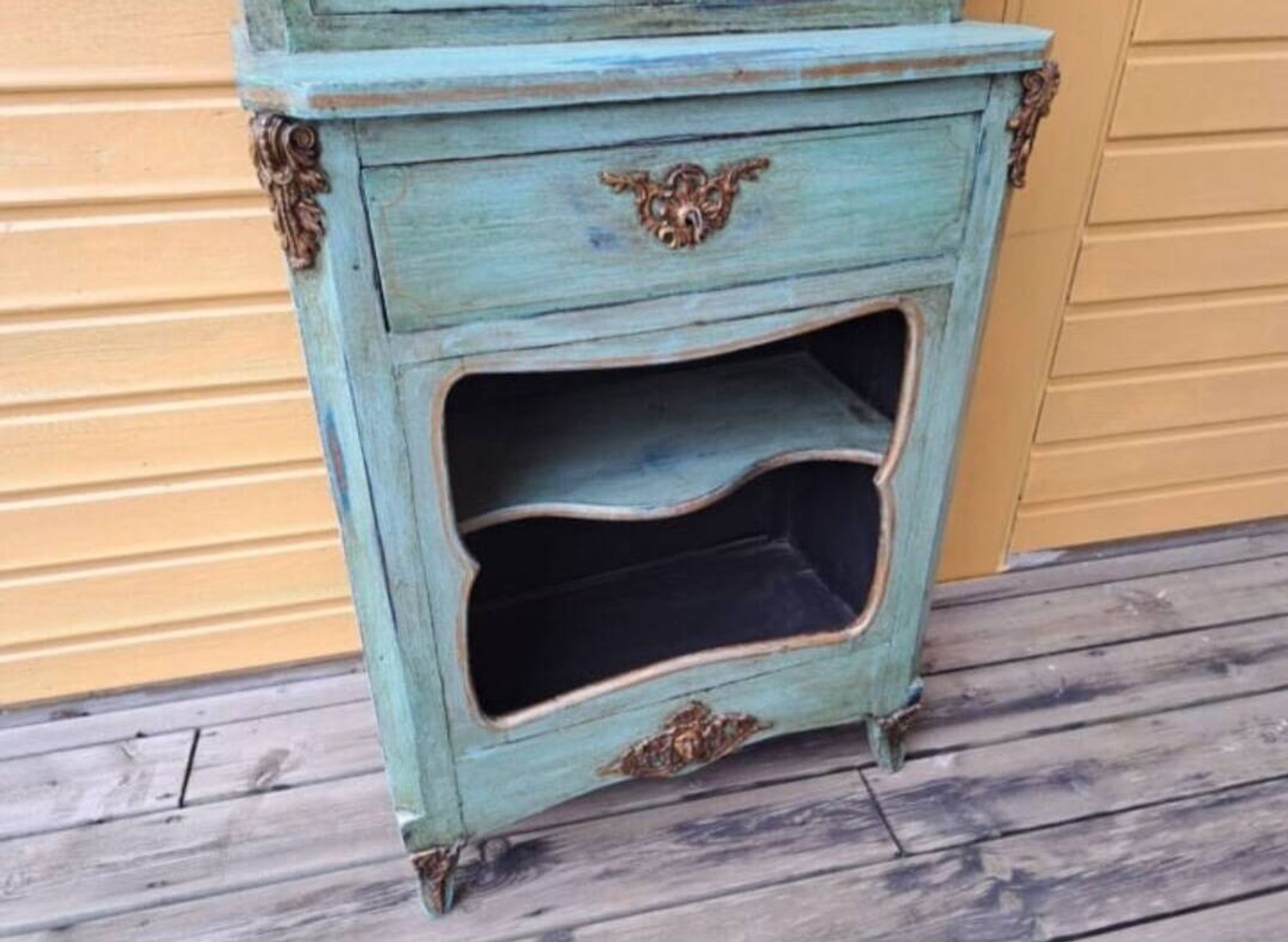 Blue patinated wooden display cabinet