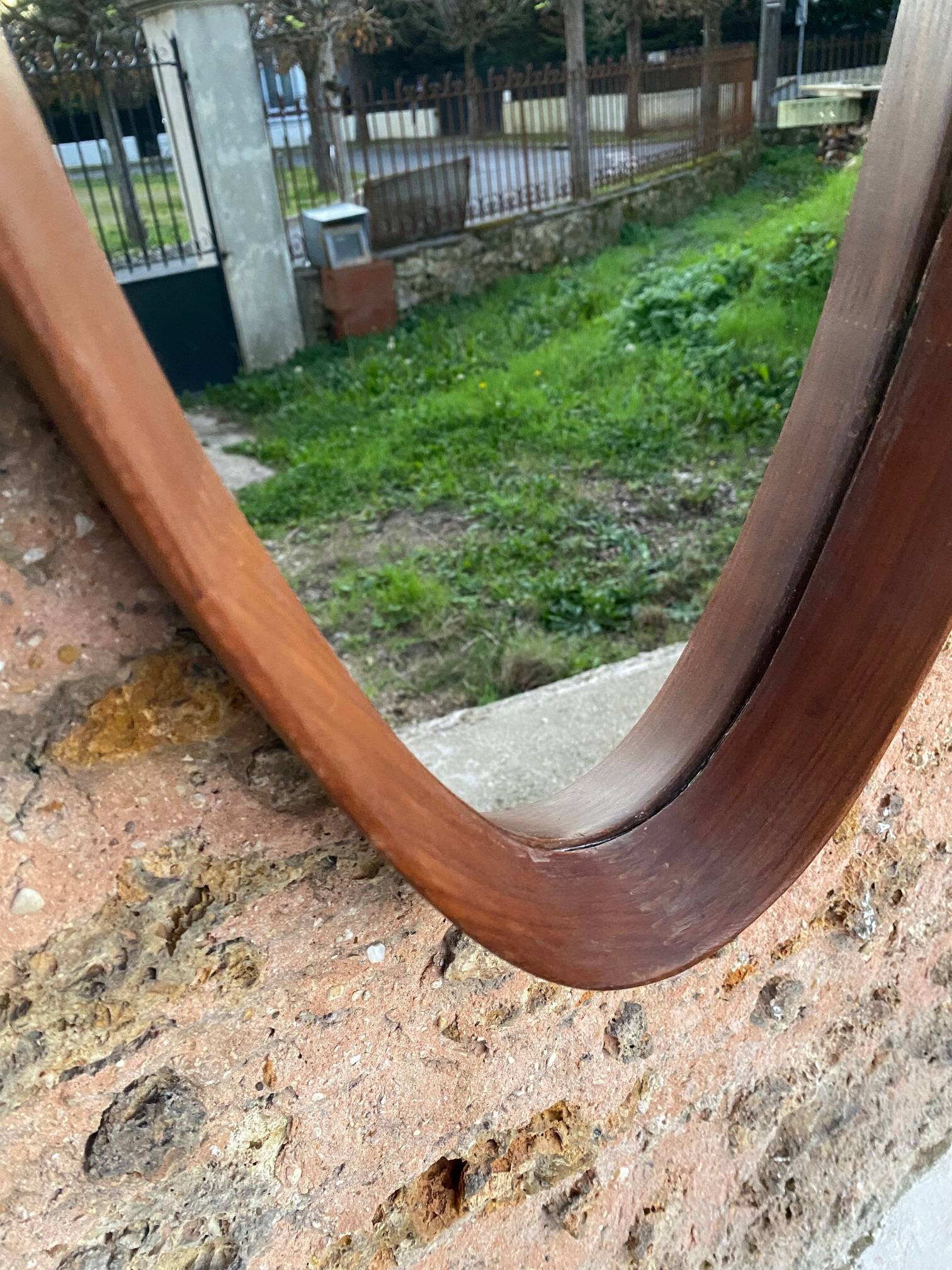 Vintage hanging oval mirror in teak Italian design