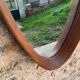 Vintage hanging oval mirror in teak Italian design