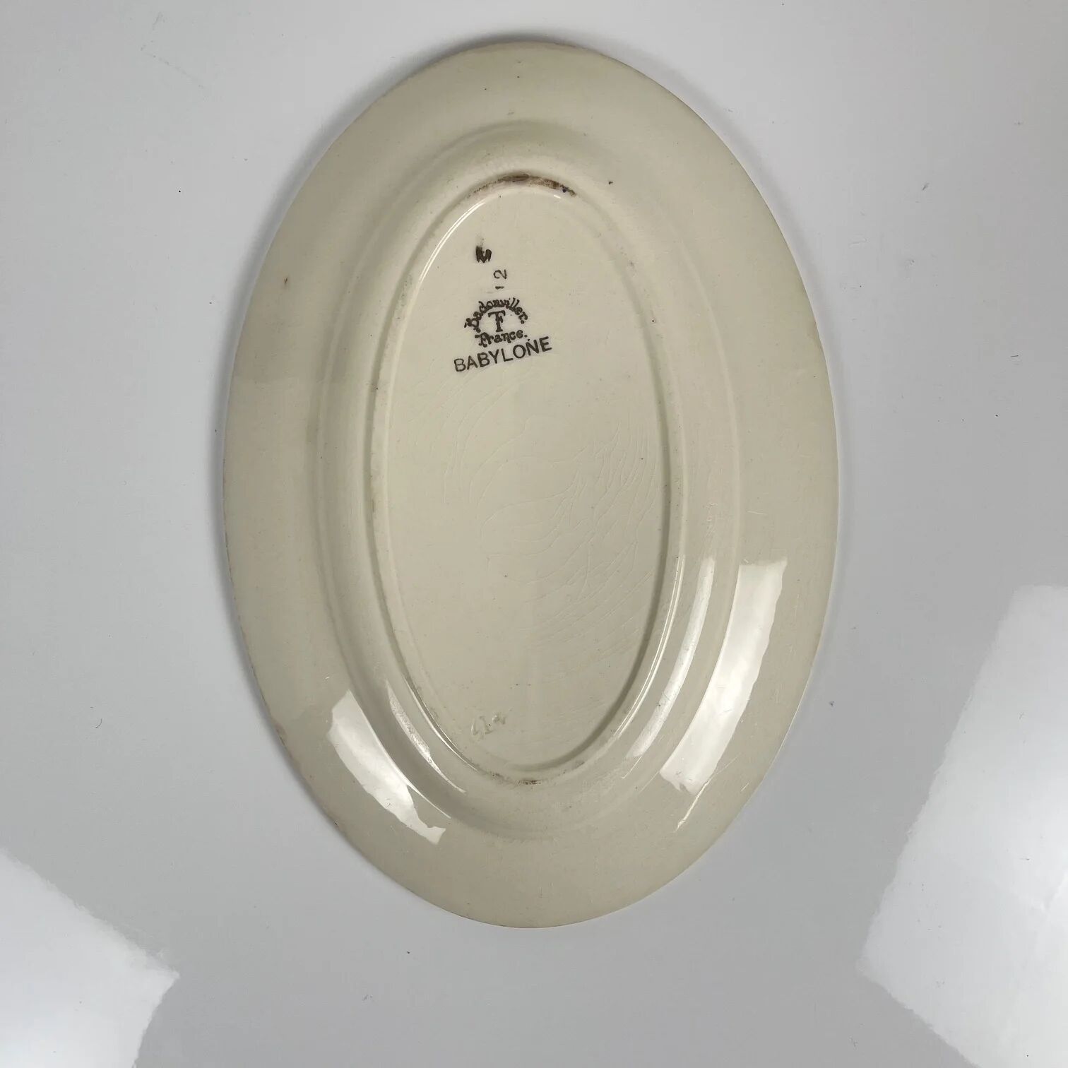 Antique oval plate "Babylon", Badonviller, 1900