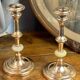 Pair of brass and stone candlesticks