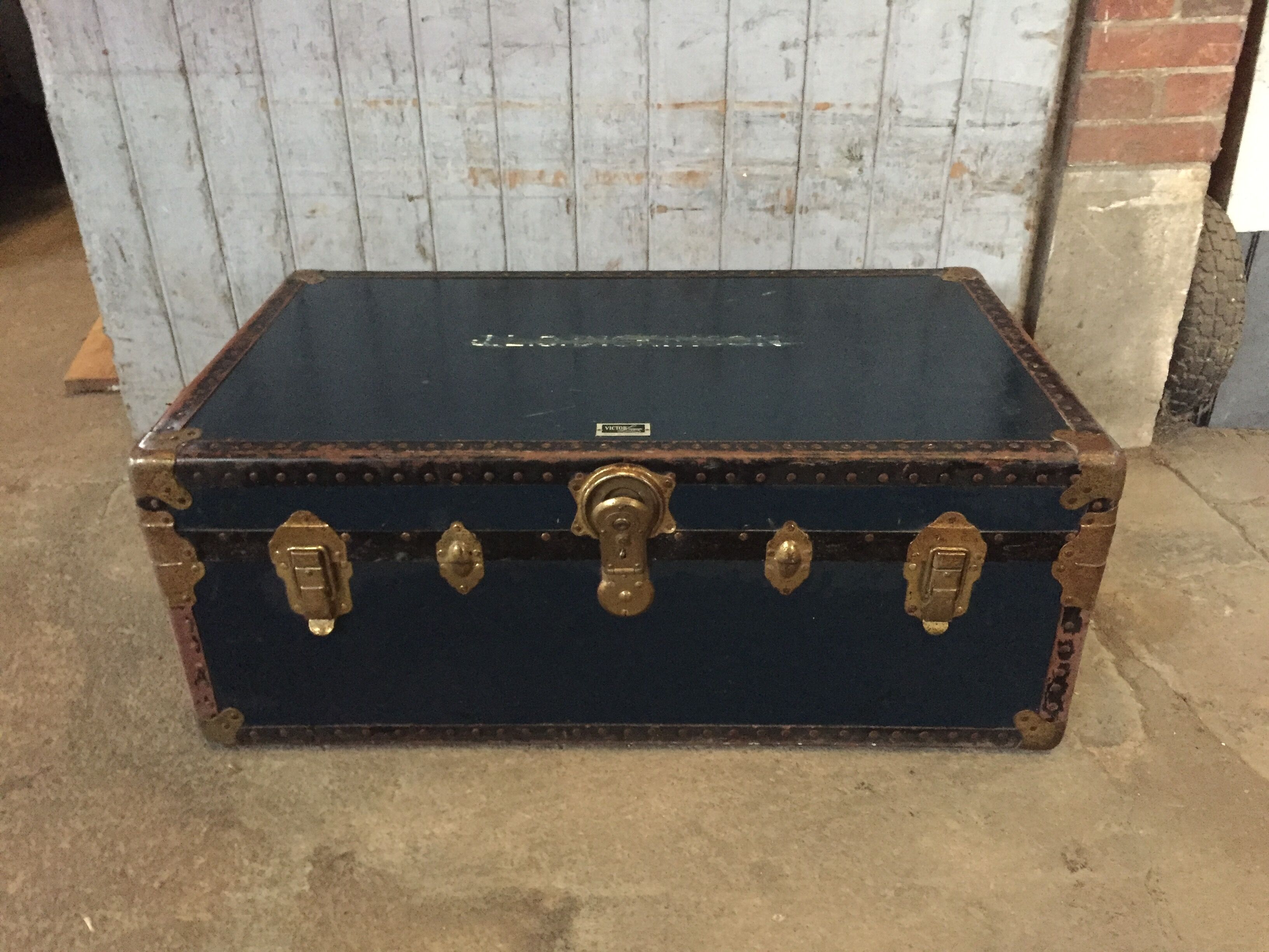 Large blue travel trunk
