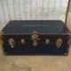 Large blue travel trunk