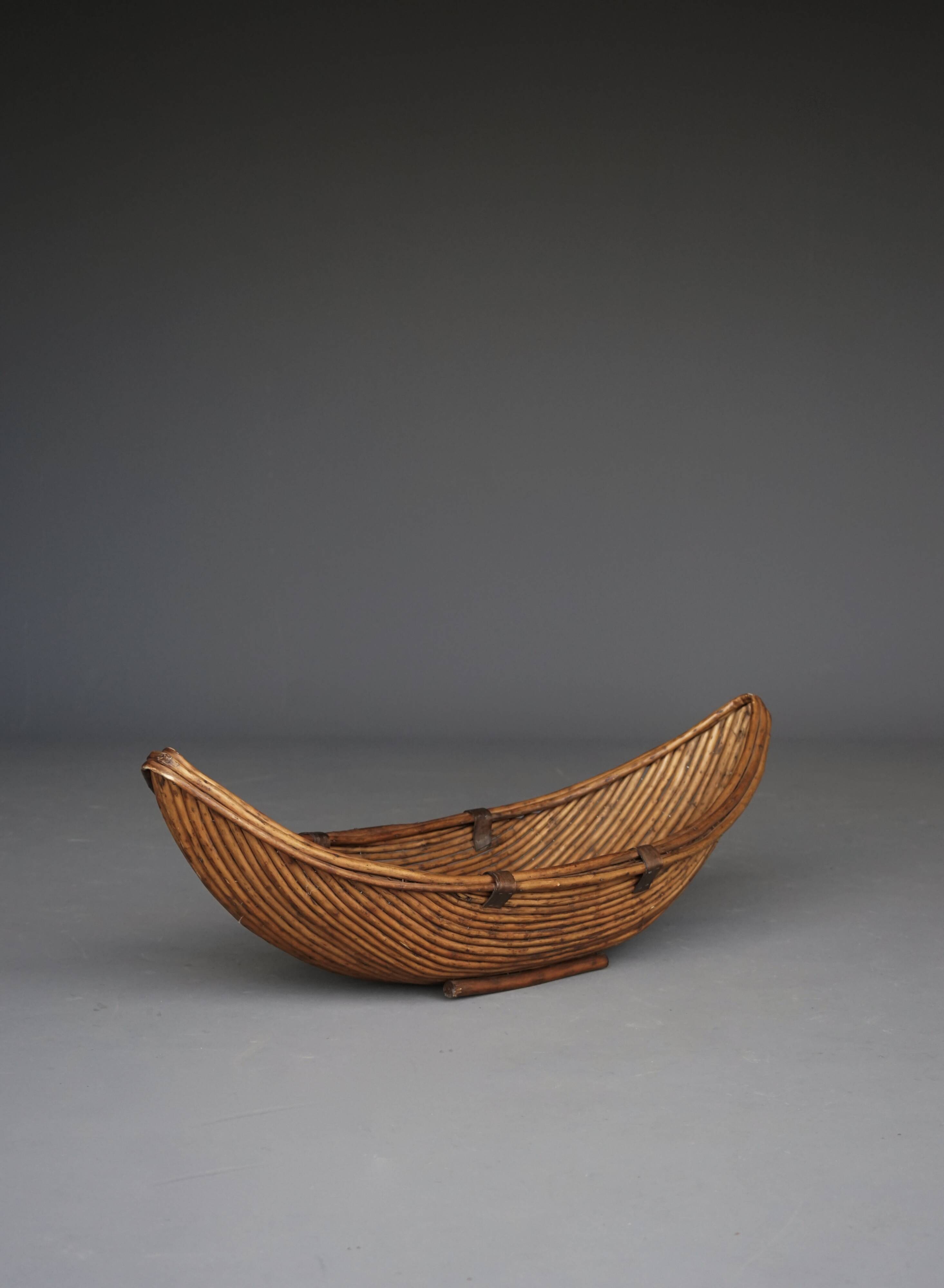 A large 1970s Rattan Basket in the manner of Gabriella Crespi