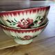 Bowls Faïencerie de Sarreguemines with rose decoration (the two red ones)