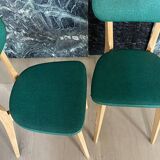Paire de chaises vintage skaï vert pieds compas