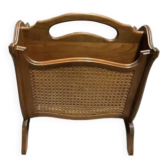 Vintage wicker newspaper rack