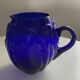 Vintage cobalt blue glass pitcher by Henry Dean