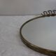 round brass mirror