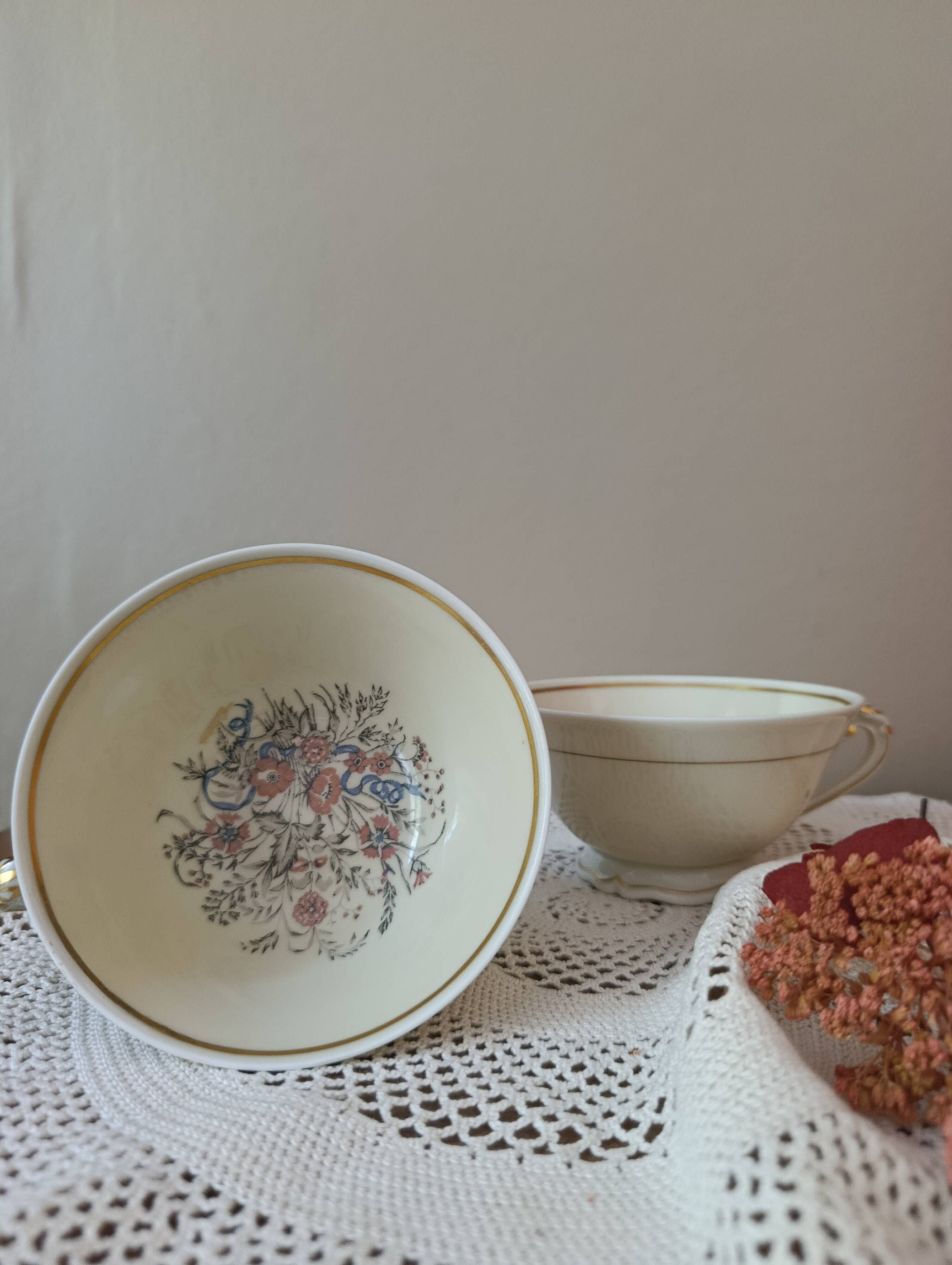 Two retro country-style porcelain tea cups, Former Royal Manufacture