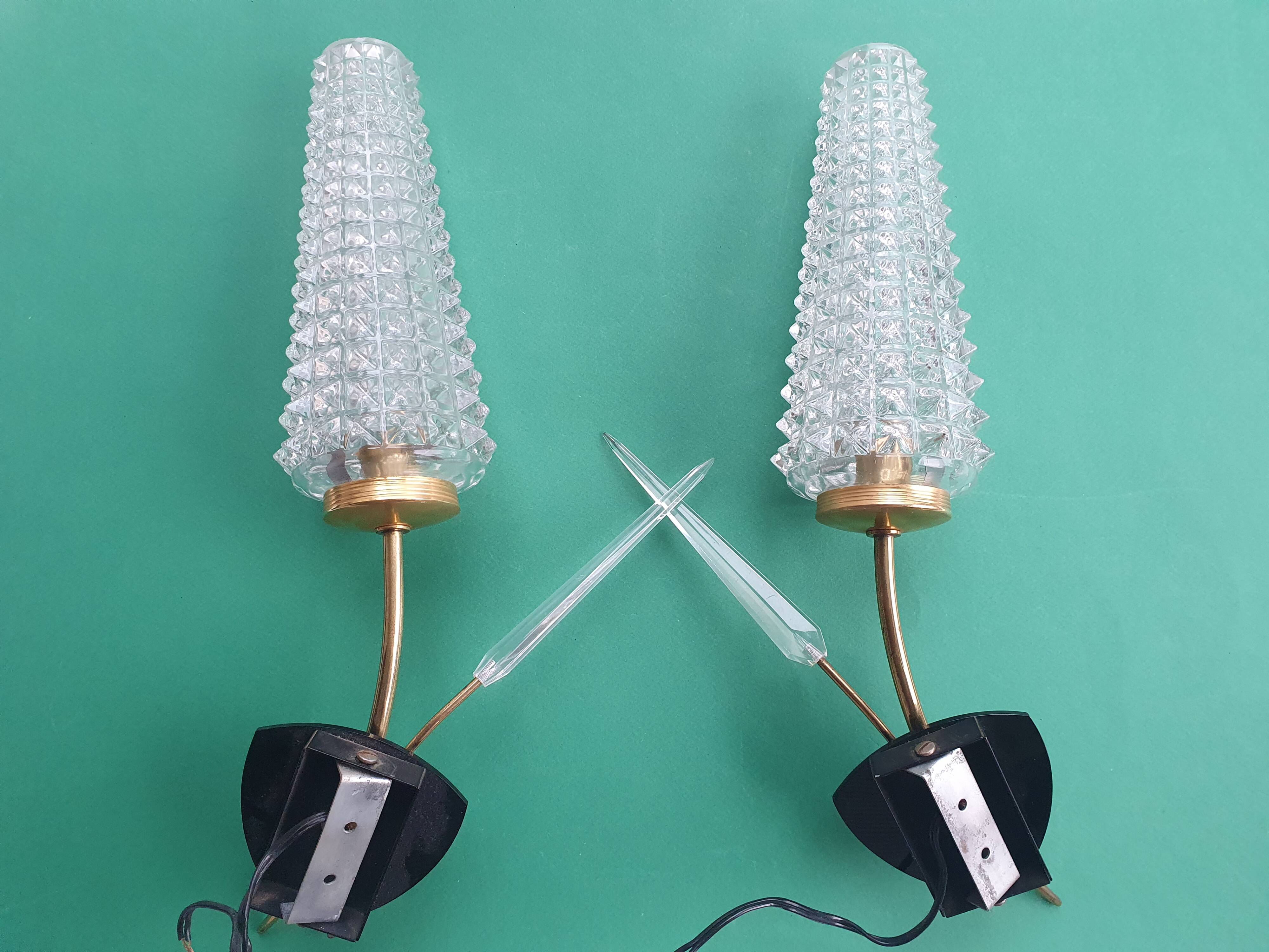 Pair of large gold wall lights with tulip-shaped globes by Arlus