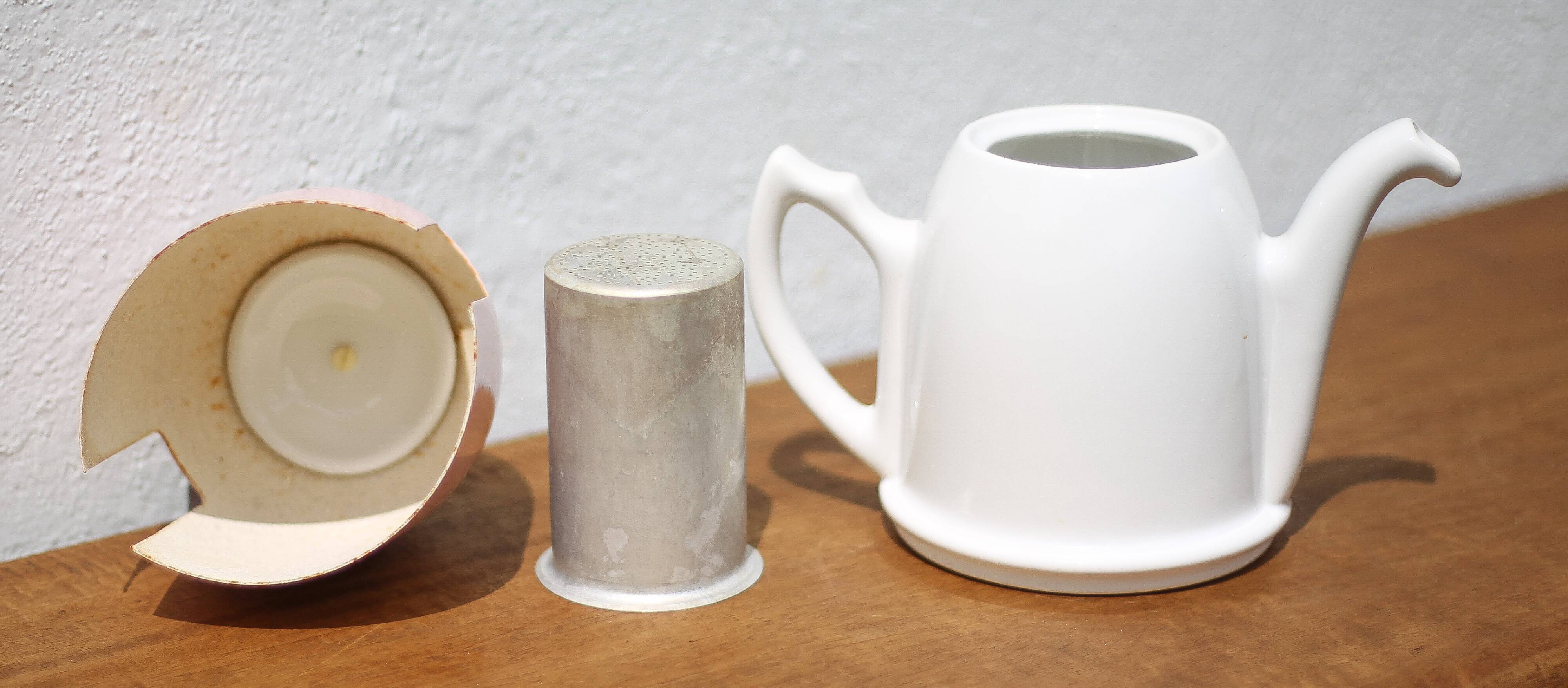 Vintage teapot, porcelain teapot and metal hat, teapot, kettle, infusion, kitchen