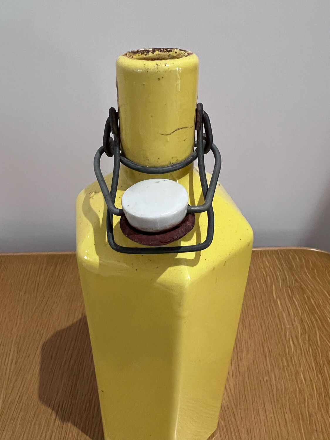 Yellow ceramic bottle