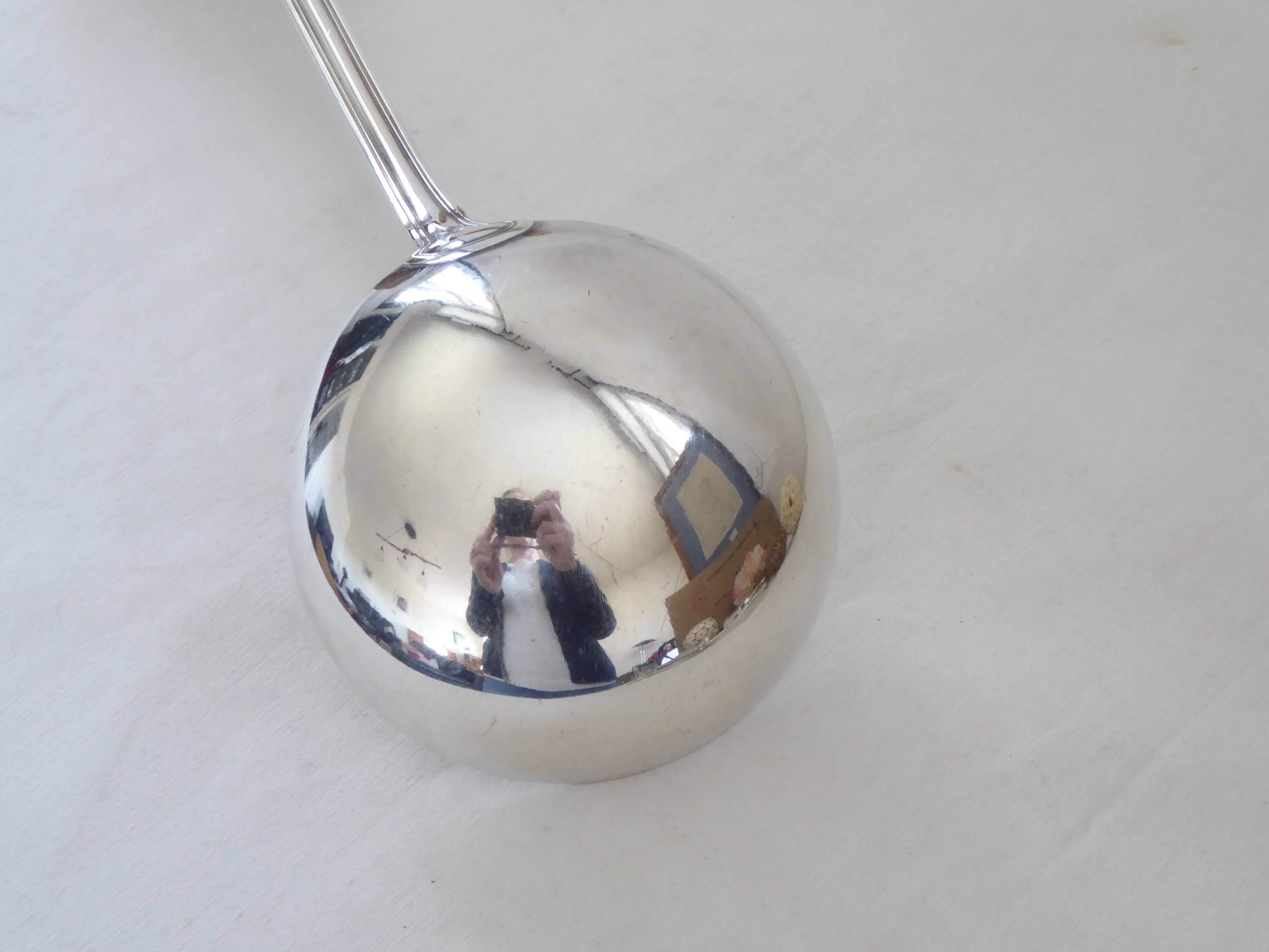 Silver metal ladle