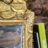 Small louis xiv mirror in gilded carved wood, early 18th century