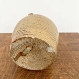 Small antique stoneware jar with handle